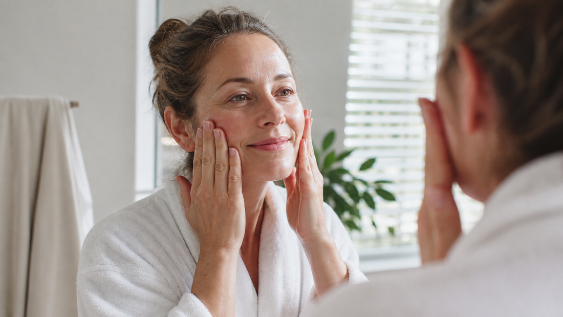 Woman following a simple morning skincare routine after 50